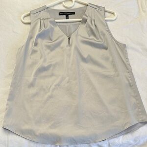 White House Black Market Light Gray V-Neck Blouse with silver detail.